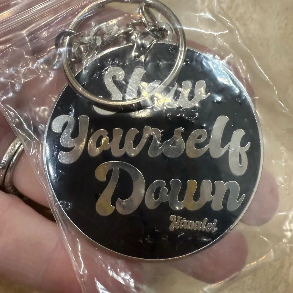 NWT Silver and Black Slow Yourself Down Keychain from Hanalei in Kauai